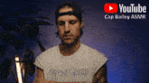 a man wearing a shirt that says " breast gump "