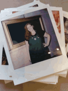 a stack of polaroid pictures shows a woman in a green shirt