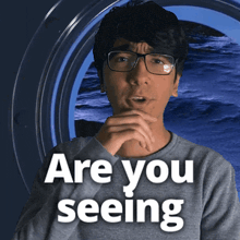 a man with glasses and the words " are you seeing "