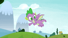 spike from my little pony is flying over a grassy hill