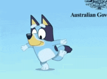 a cartoon dog is dancing in front of an australian gov. poster