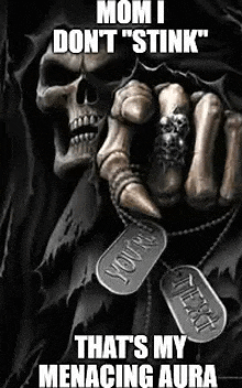 a grim reaper is holding a fist in front of a skull and dog tags .