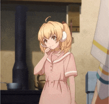 a girl in a pink dress with white ears