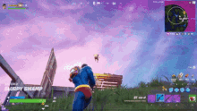 a man in a superman costume is playing a video game called fortnite