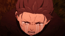 a close up of a person 's face with tears running down their face
