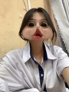a girl wearing a white shirt and a blue tie has a very large mouth