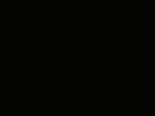a man is standing in a dark room with a window