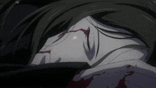 a person with blood coming out of their nose