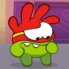a green cartoon character with red hair and a red headband