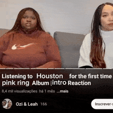 two women are sitting on a couch and listening to houston for the first time pink ring album intro reaction .