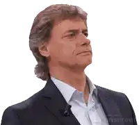 a man in a suit with a microphone on his collar is made with sunscreen