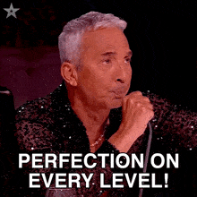 a man says perfection on every level in a speech