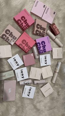 a bunch of boxes of beauty products including issy