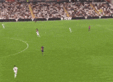 a soccer game is being played in a stadium with a banner for fc25