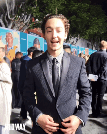 tongue out feeling good handsome good looking suit on
