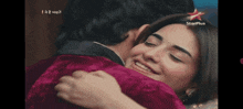 a man and a woman hugging with a star plus logo on the top