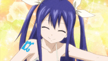 a girl with blue hair has a tattoo on her shoulder that says x