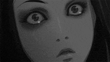 a black and white drawing of a woman 's face with large eyes