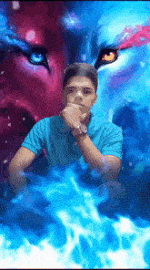 a young man in a blue shirt stands in front of a painting of a wolf 's face