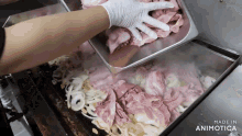 a person is pouring meat into a pan that says made in animatica on the bottom