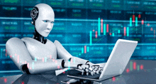 a robot is typing on a laptop in front of a chart
