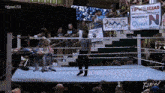 a wrestling ring with a sign that says queri