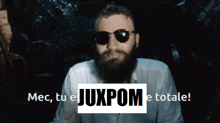 a man with a beard wearing sunglasses says mec tu e juxpome totale