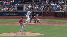 a baseball game is being played and the score is 0-0