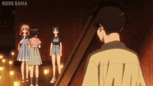 a man stands in front of a group of girls with nddds sama written on the bottom of the image