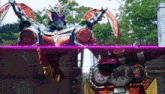 a robot is being transformed into another robot with a purple light behind it