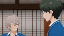 two anime characters are standing next to each other in a room .