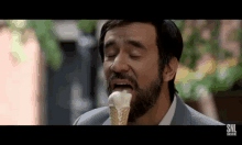 boy man eat lick ice cream