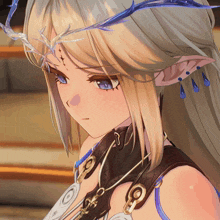 a close up of a girl with a crown on her head and a necklace