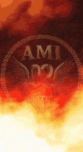 a logo for ami 02 with wings and a greek key border