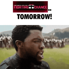 a man with a beard is screaming in front of a sign that says fighting chance tomorrow