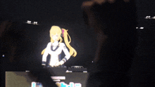 a girl with blonde hair is dancing in front of a sign that says tokyo