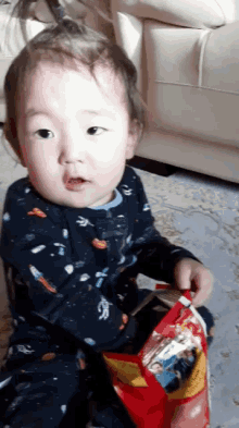 Amazed Baby Boy GIF - Amazed Baby Boy Food Coma GIFs