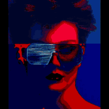 a woman wearing a pair of futuristic sunglasses with red and blue lights behind her