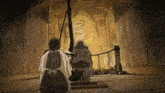 a cartoon drawing of a man and a woman looking at a fire