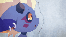 a cartoon drawing of a blue monster with a purple and orange face