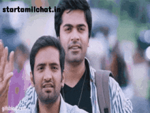 two men are standing next to each other and the website starttamilchat.in is visible in the background