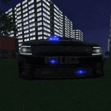 a police car is parked in front of a city skyline at night