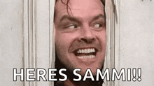 a man is looking through a hole in a door with the words `` heres sammi ! ''