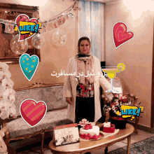 a woman in a white coat stands in front of a table with a cake on it and a like sticker on it
