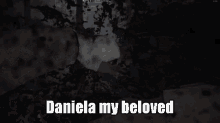 a black and white photo of a woman with the words daniela my beloved on the bottom