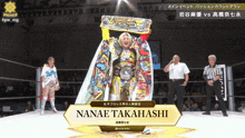 a wrestler named nanae takahashi stands in a ring