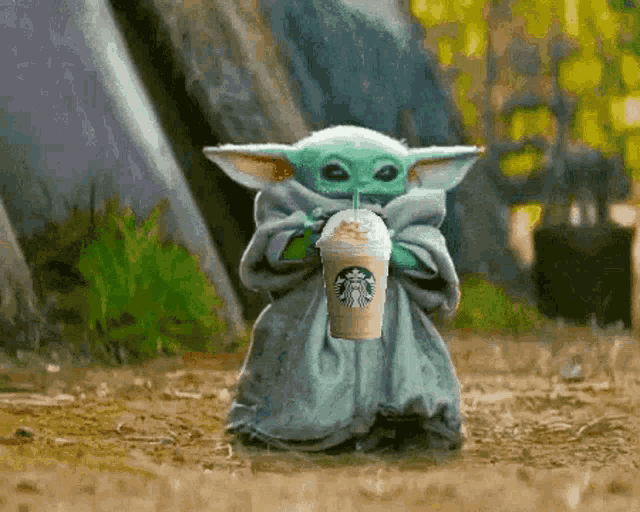 Grogu Baby Yoda Drinking from Cup