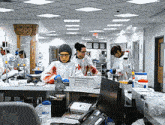 a woman in a lab coat with blood on her face stands in front of an hp printer