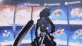 a blurry picture of a person holding a sword in front of a display of cards .