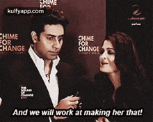 a man and a woman are talking to each other and the man is saying and we will work at making her that